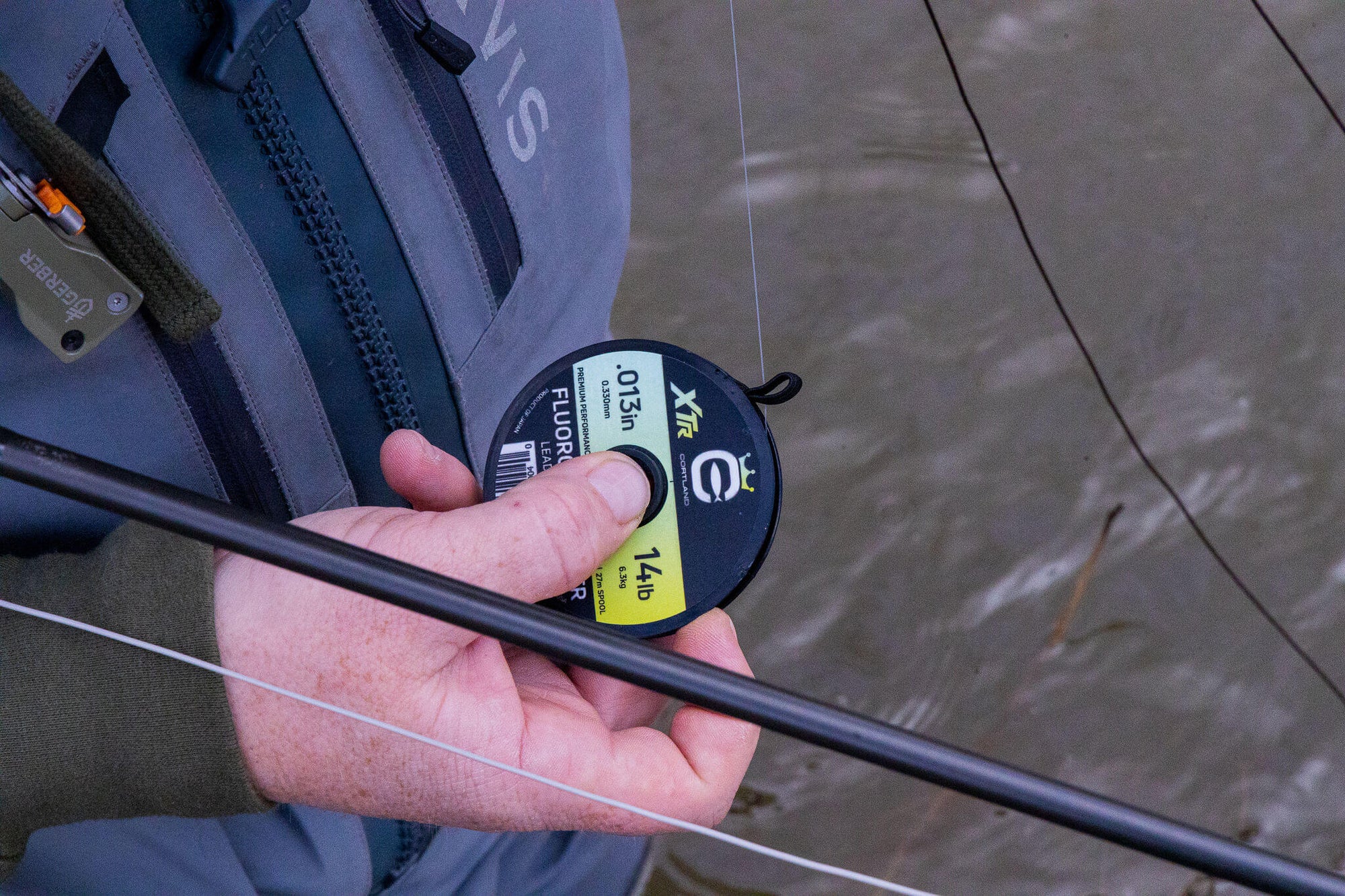 Closeup shot of Flurocarbon XTR Leader Material in a fisherman's hand
