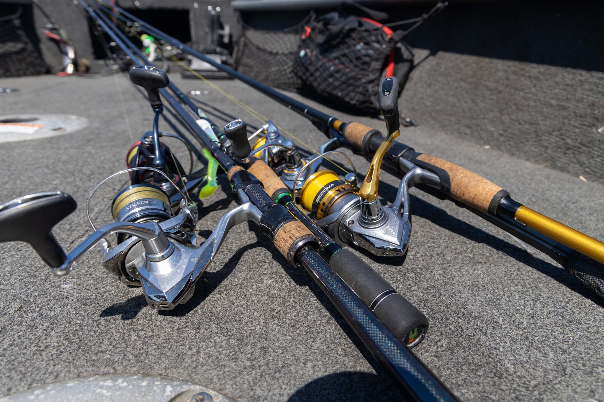 Bottom view of four fishing poles.