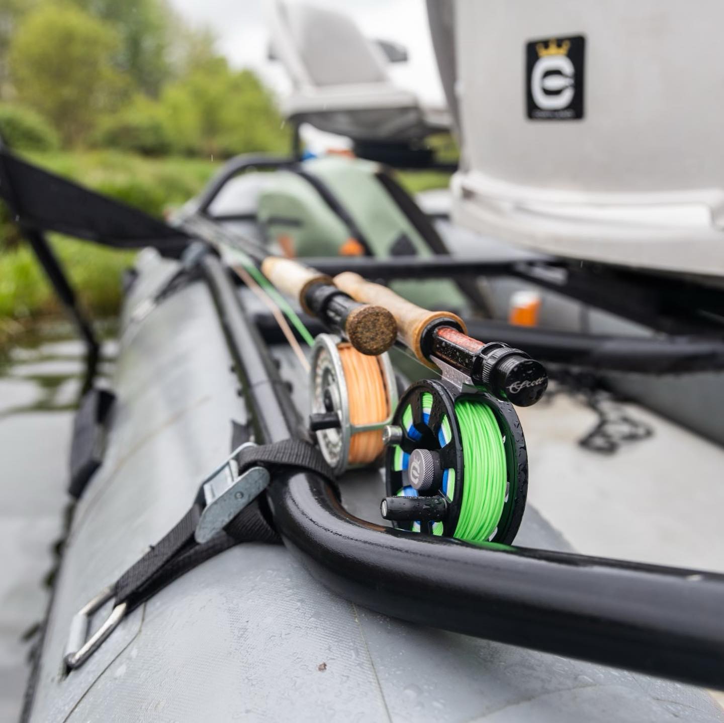 Two fly rods on a boat. One is lined with 444 Peach and another with 444 SL