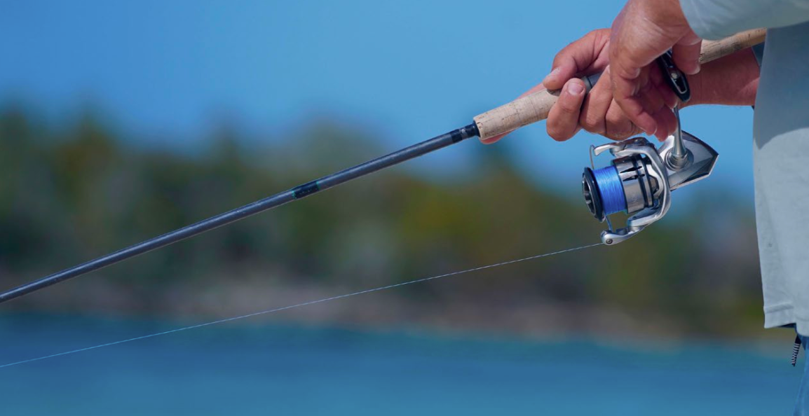 Angler fishing with Cortland Master Braid Blue from a boat