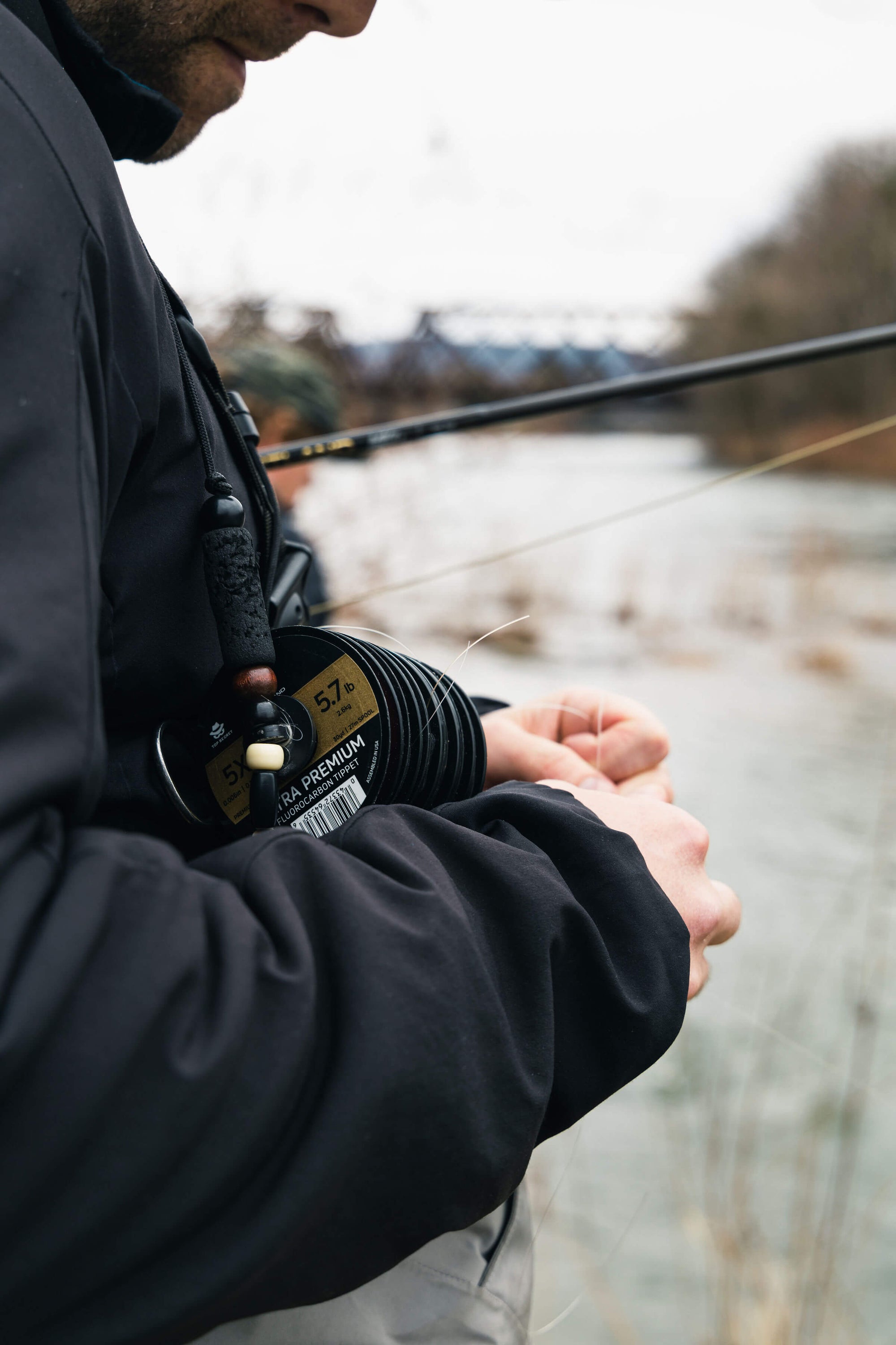 Angler preparing his Ultra Premium Fluorocarbon Tippet 